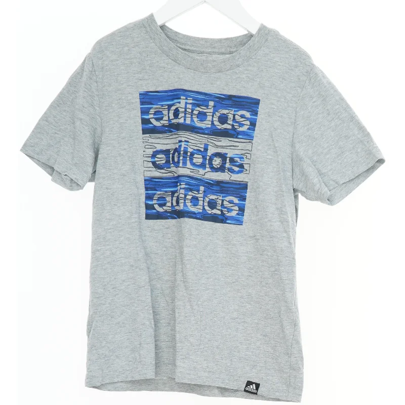 Grå T-shirt med Adidas logo fra Adidas (str. S)