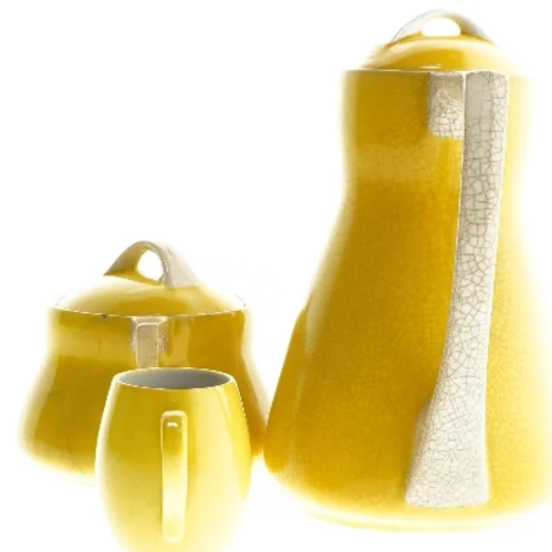 Gult kaffestel i keramik (str. 22, ø 12, 7 cm)