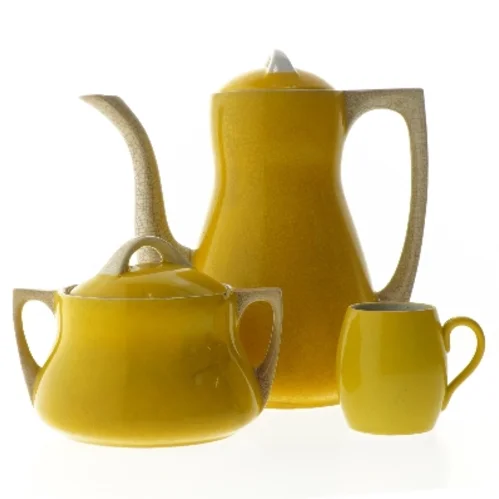 Gult kaffestel i keramik (str. 22, ø 12, 7 cm)
