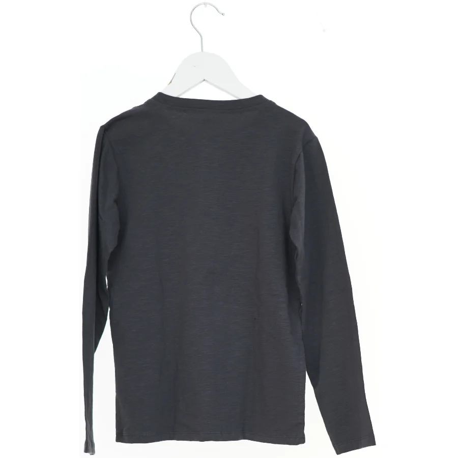 Langærmet bluse med knapper fra Friends (str. 134)
