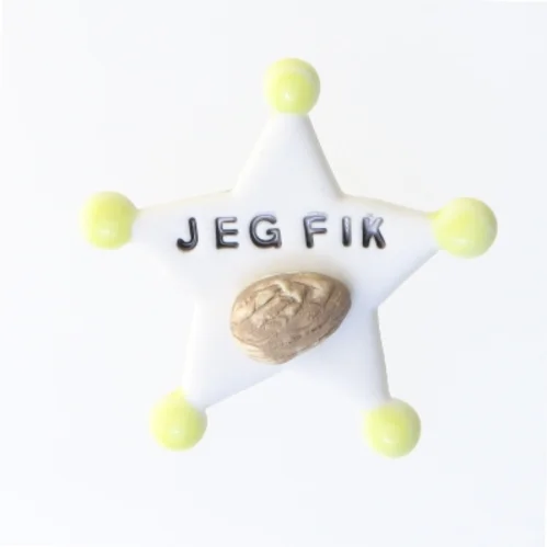 Badge med tekst 'JEG FIK' (str. 7 cm)