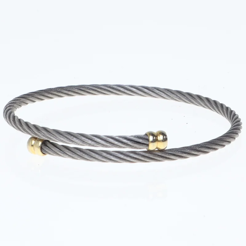 Stålarmbånd med gulddetaljer (str. 6,5 cm)