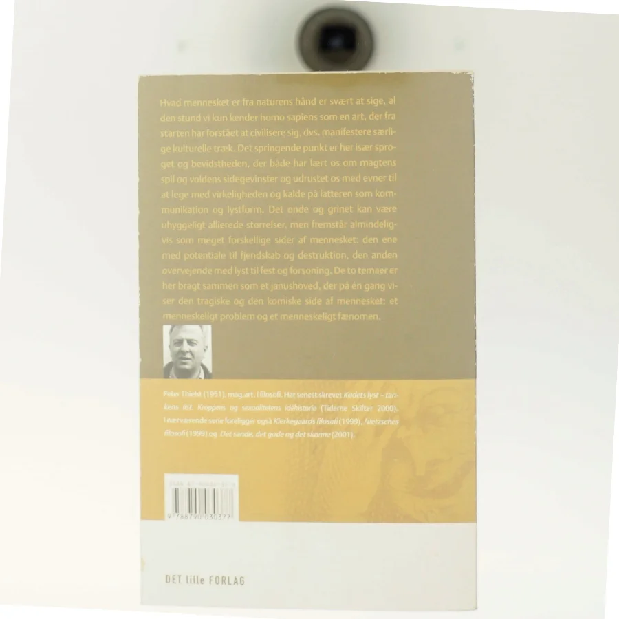 Det onde & Latterens lyst : to sider af mennesket, to idéhistoriske indføringer af Peter Thielst (Bog)