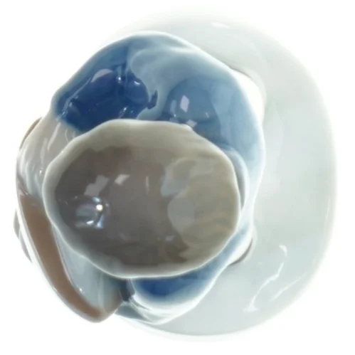 Porcelænsfigur af en dreng fra B&G (str. 18x6 cm)