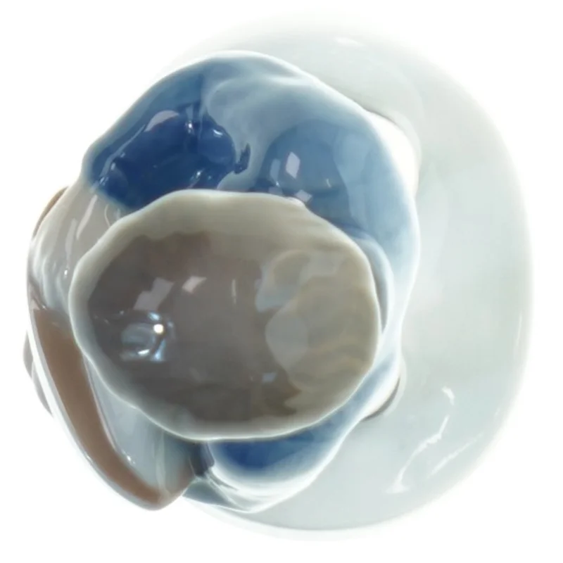 Porcelænsfigur af en dreng fra B&G (str. 18x6 cm)