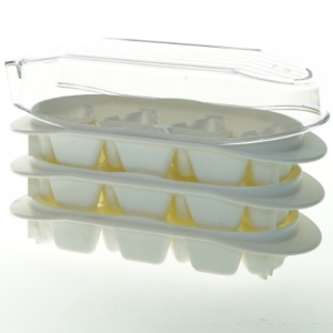 Forme til fylde chokolade/ isterninger  med låg fra Tupperware (str. 21x9 cm)