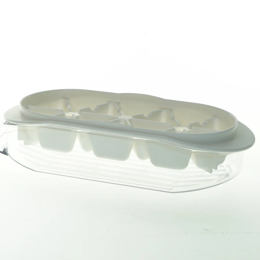 Forme til fylde chokolade/ isterninger  med låg fra Tupperware (str. 21x9 cm)