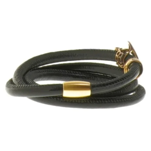 Sort læderarmbånd med guld detaljer fra Christina Watches (str. Ø 5,5 cm)