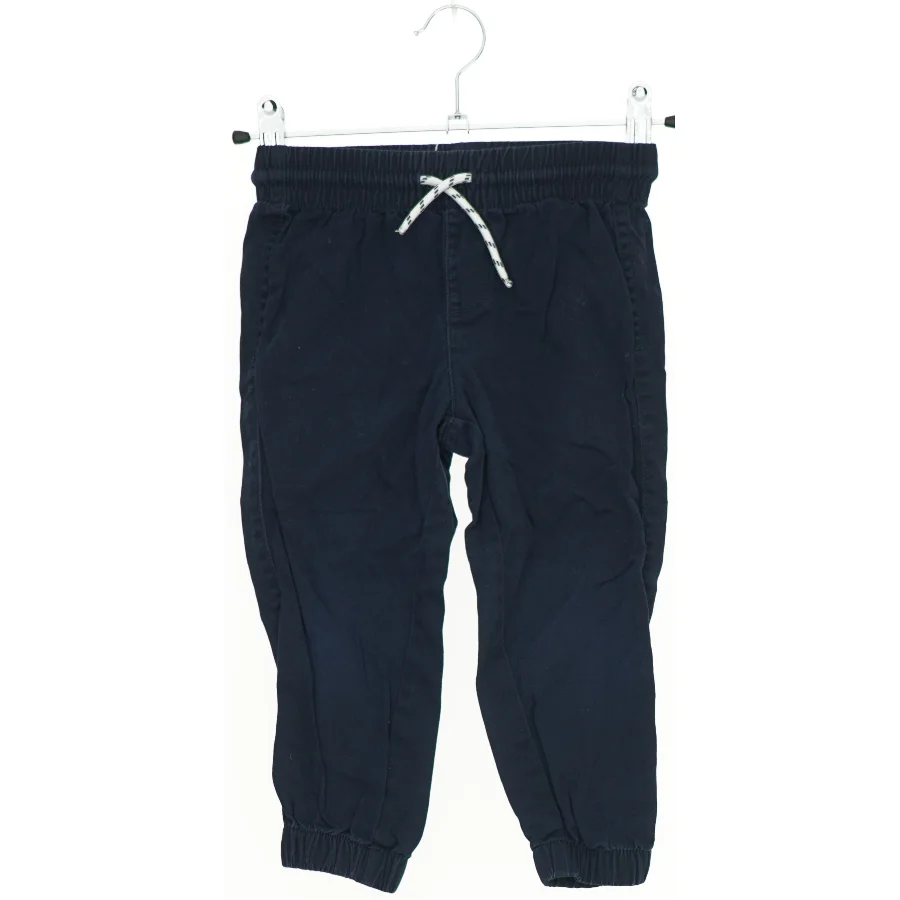 Mørkeblå bukser til børn fra H&M (str. 92)