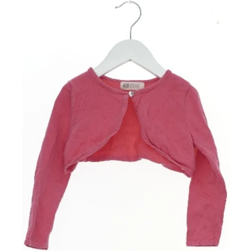 Lyserød bolero til børn fra H&M (str. 104)