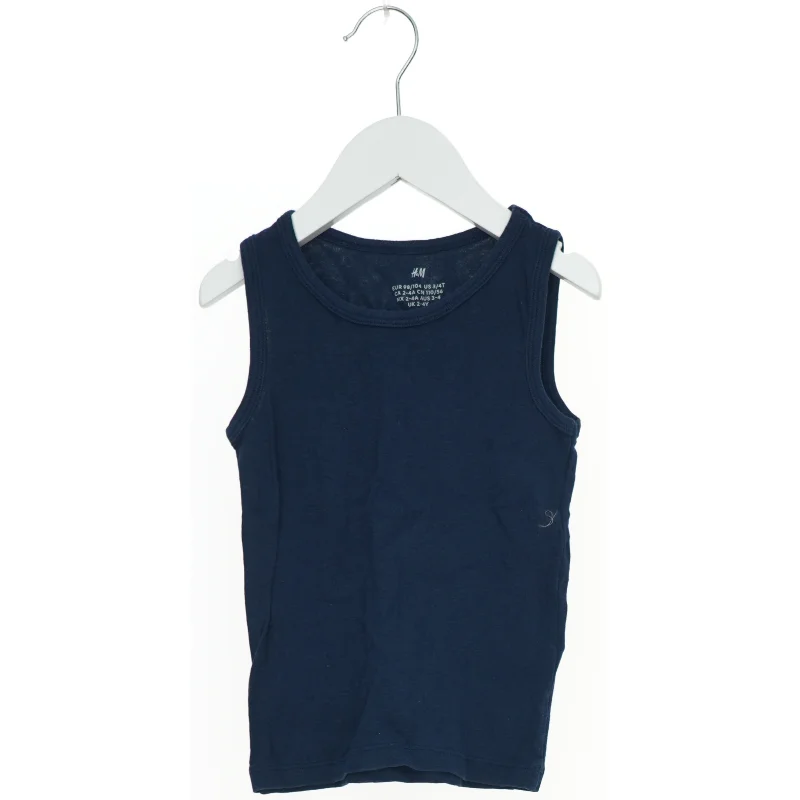 Marineblå tanktop fra H&M (str. 104)