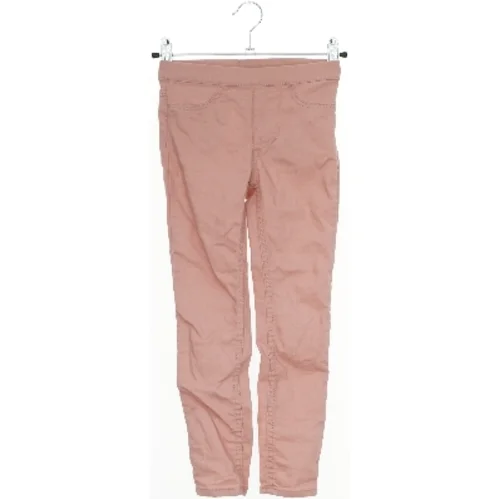 Lyserøde jeans fra H&M (str. 116)