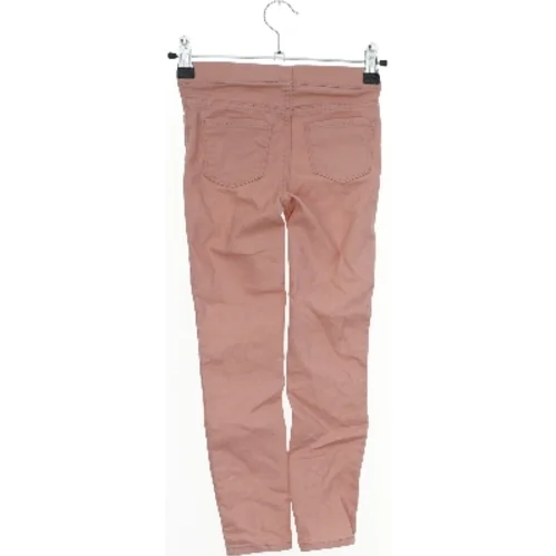 Lyserøde jeans fra H&M (str. 116)