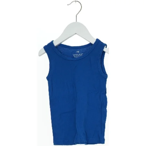 Blå tanktop fra H&M (str. 104)