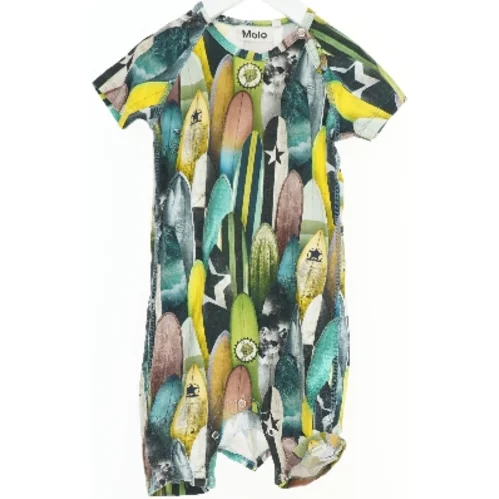 Heldragt med surfbrætter design fra Molo (str. 86)