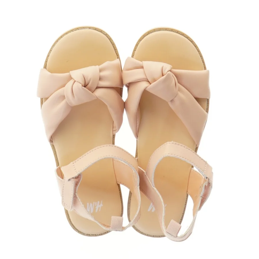 Lyserøde børnesandaler med knude fra H&M (str. 29 )