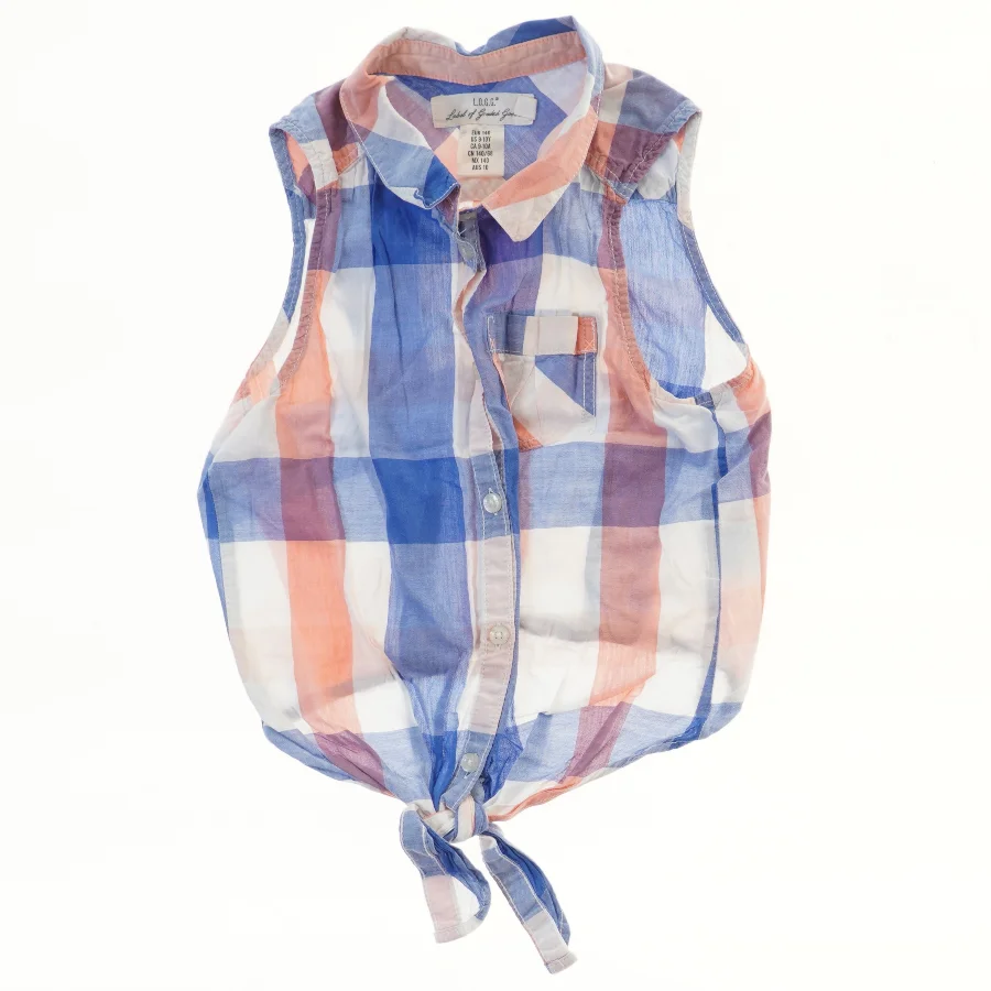 Ærmeløs skjorte med ternet mønster fra H&M (str. 140)