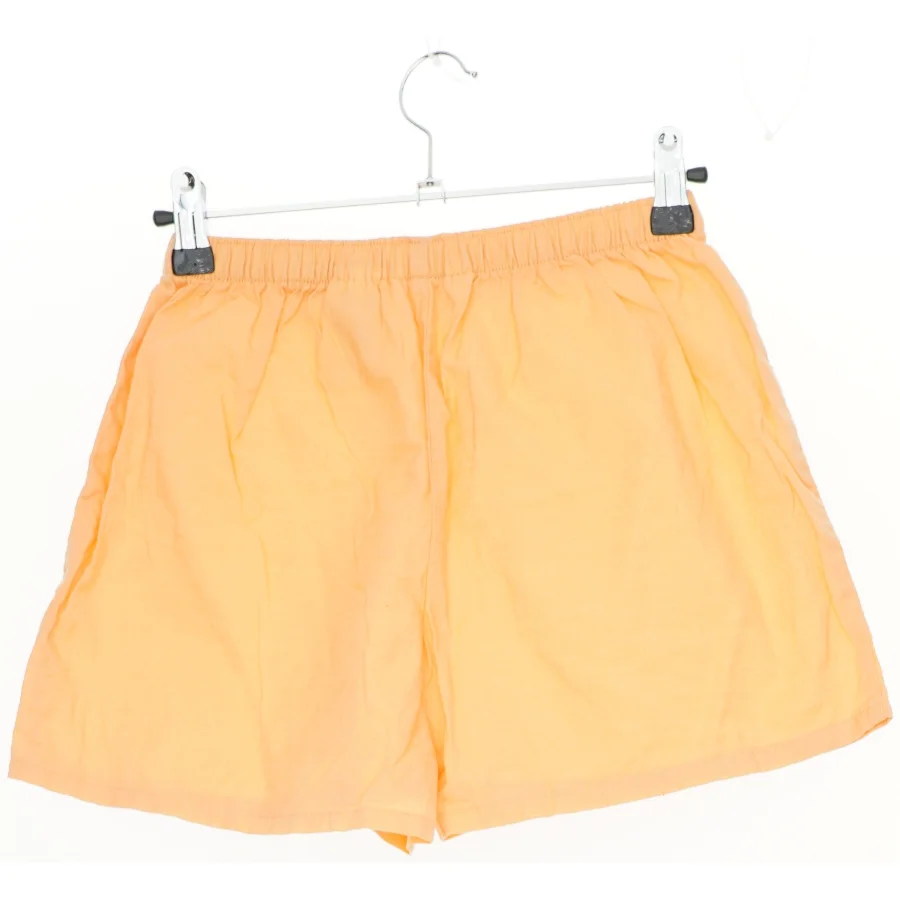 Orange shorts fra H&M (str. 134)