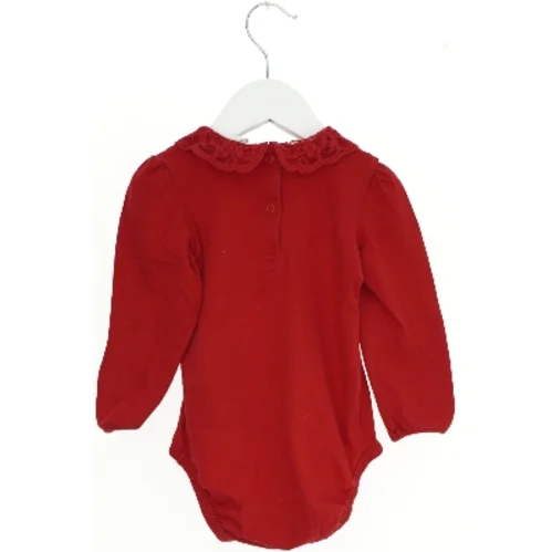 Rød bodystocking med blondekrave fra H&M (str. 86)