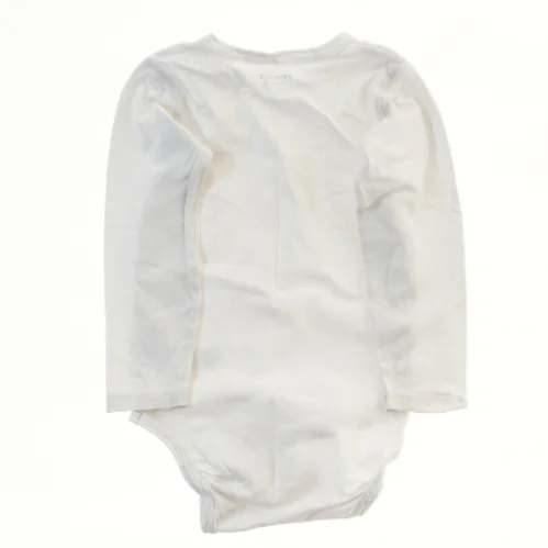 Hvid bodystocking med lange ærmer fra Friends (str. 98)