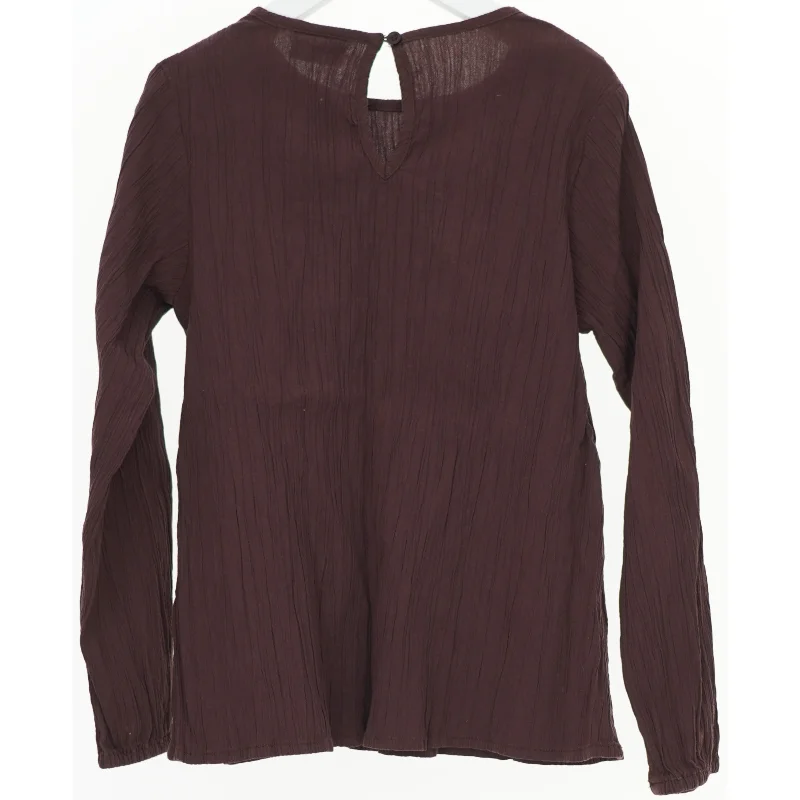 Langærmet bluse fra Friends (str. 134)