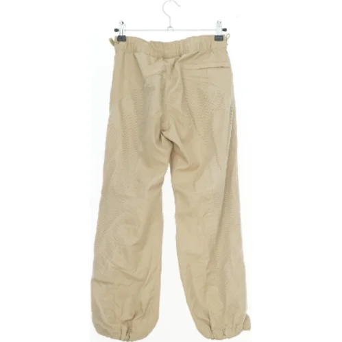 Beige bukser med elastik fra Du8ster (str. 134)