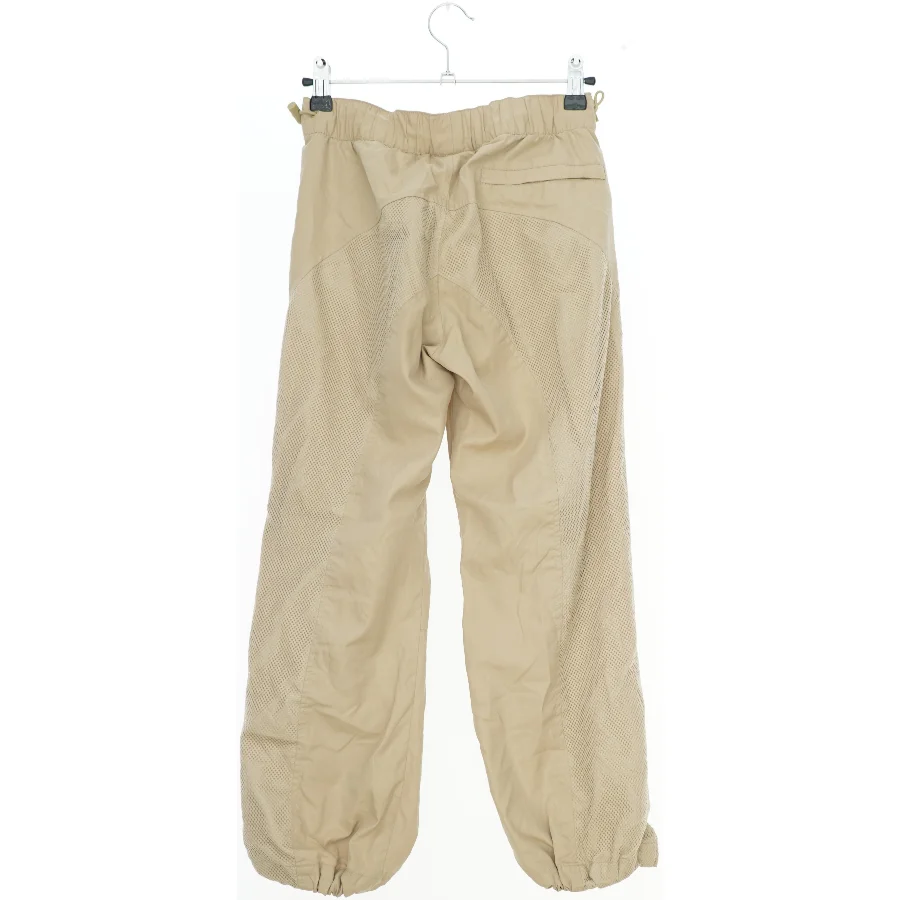 Beige bukser med elastik fra Du8ster (str. 134)