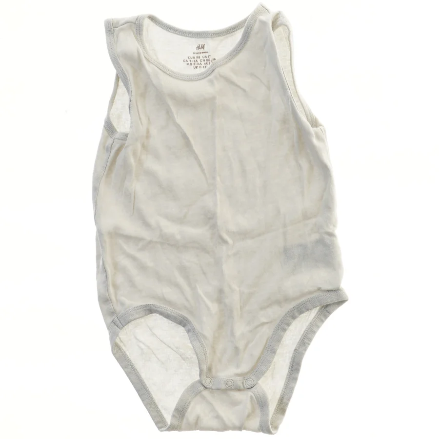 Hvid bodystocking til baby fra H&M (str. 98)