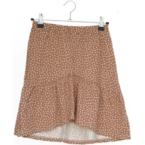 Prikket nederdel fra H&M (str. 158)