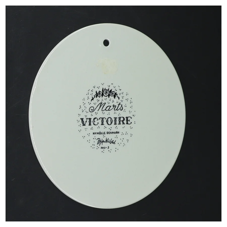 Dekorativ platte med kunstnerisk motiv fra Bjorn Wiinblad (str. Ø 15,5 cm)