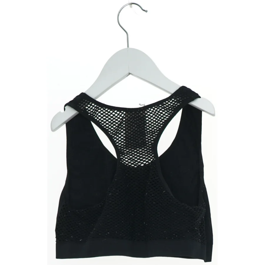 Sort sportsbh med netdetaljer fra H&M (str. 158)