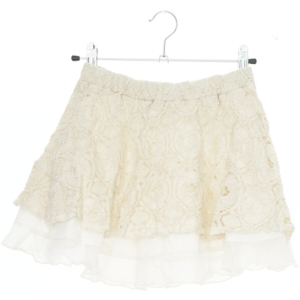 Blonde nederdel med lag fra Units (str. 128)