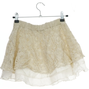 Blonde nederdel med lag fra Units (str. 128)