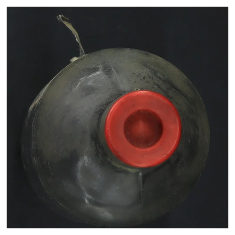 Gammel flaske med etiket (str. 22x6 cm)