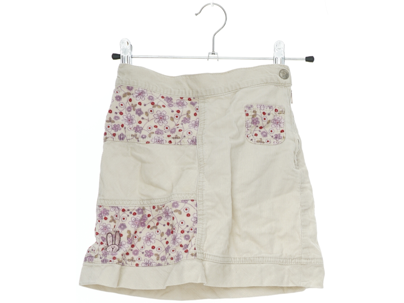 Beige nederdel med blomsterprint fra H&M (str. 122)