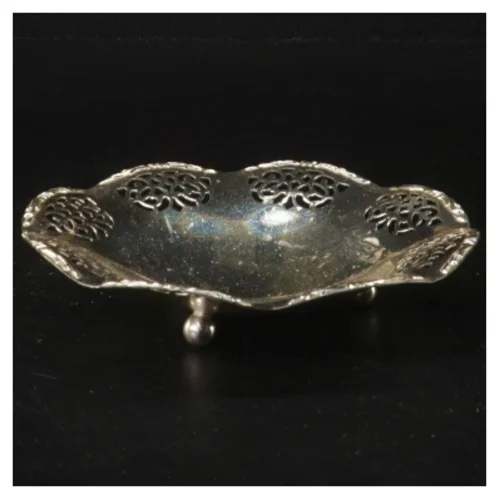 Dekorativ skål i sølvfarve (str. 14x2 cm)