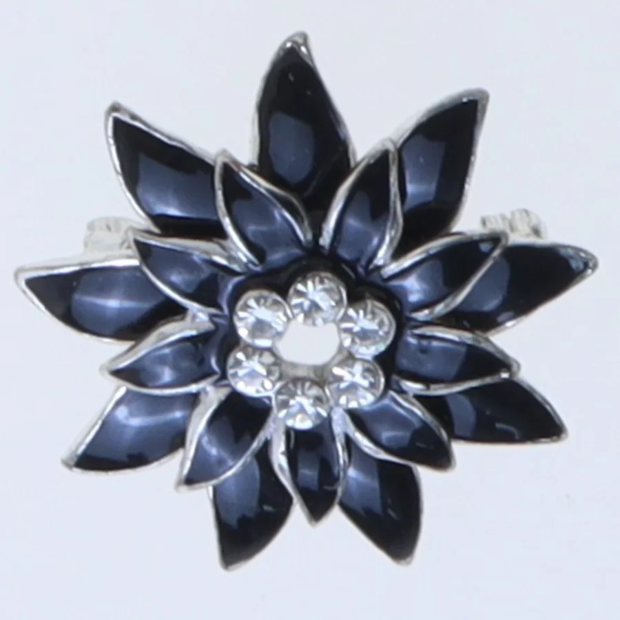 Blomstformet broche i sort (str. 3,5 cm)