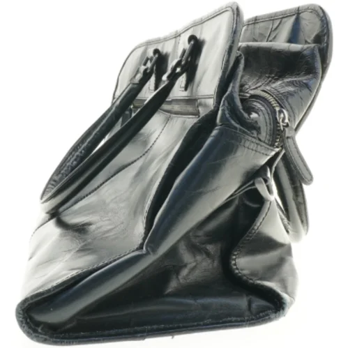 Brugt sort skuldertaske (str. 55 x 20 cm)