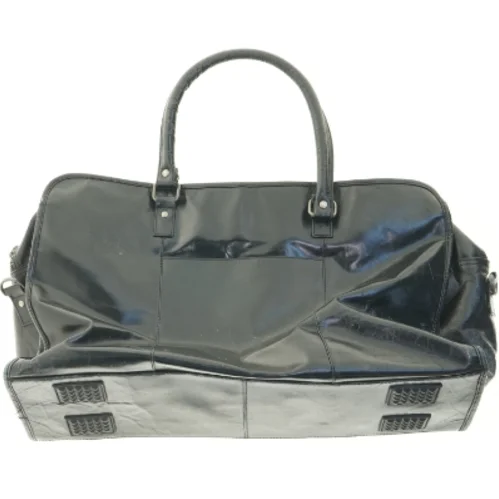 Brugt sort skuldertaske (str. 55 x 20 cm)