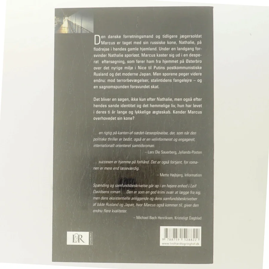 Den ukendte hustru : roman af Leif Davidsen (Bog)