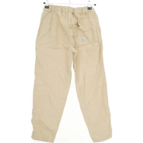 Beige bukser med elastisk talje fra Name It (str. 134)