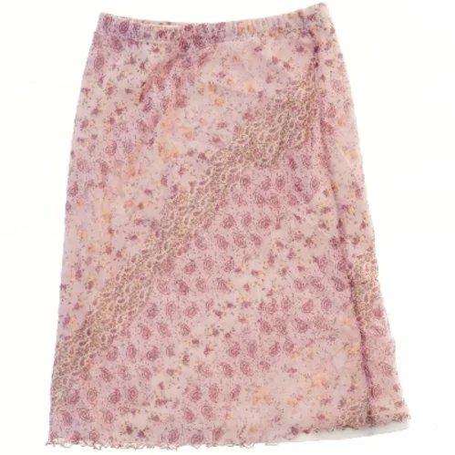 Blomstret nederdel fra Girls  (str. 134)