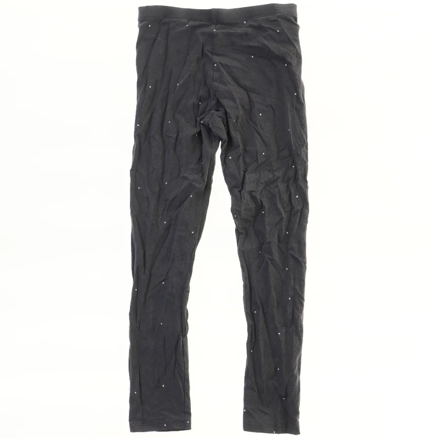 Leggings med små hvide prikker fra H&M (str. 134)