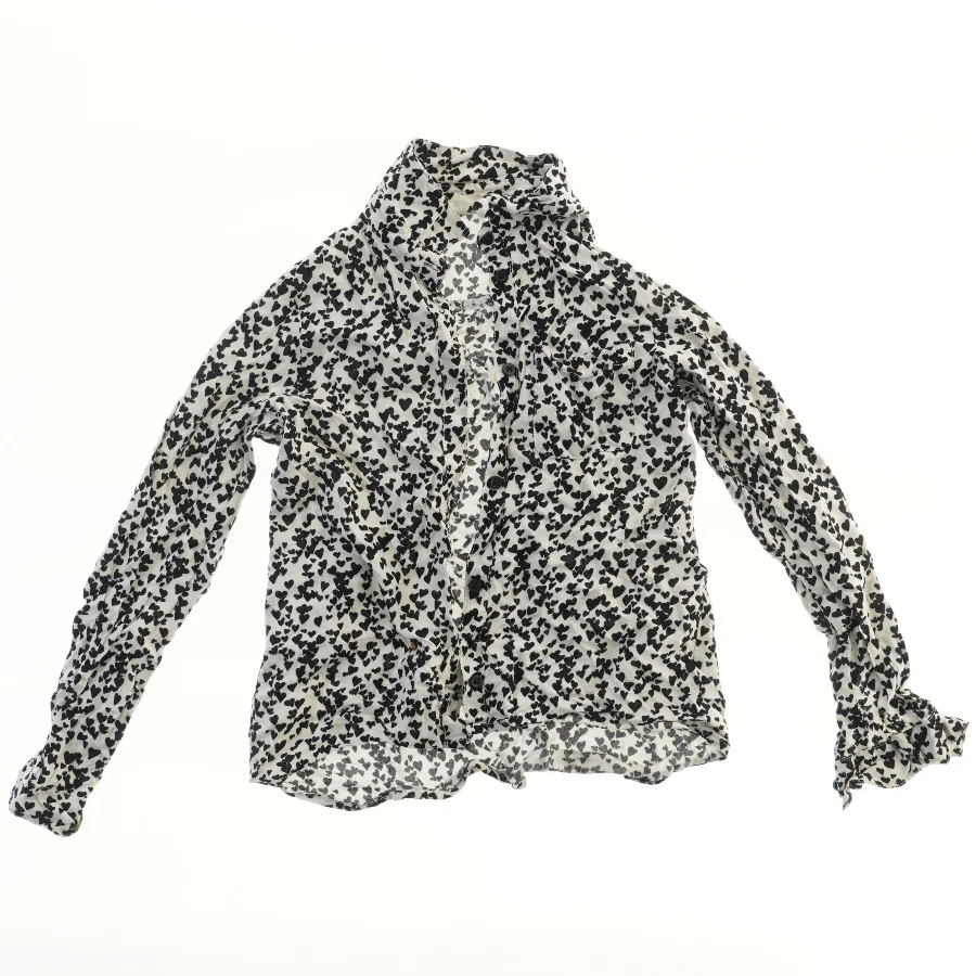 Langærmet mønstret skjorte fra H&M (str. 140)