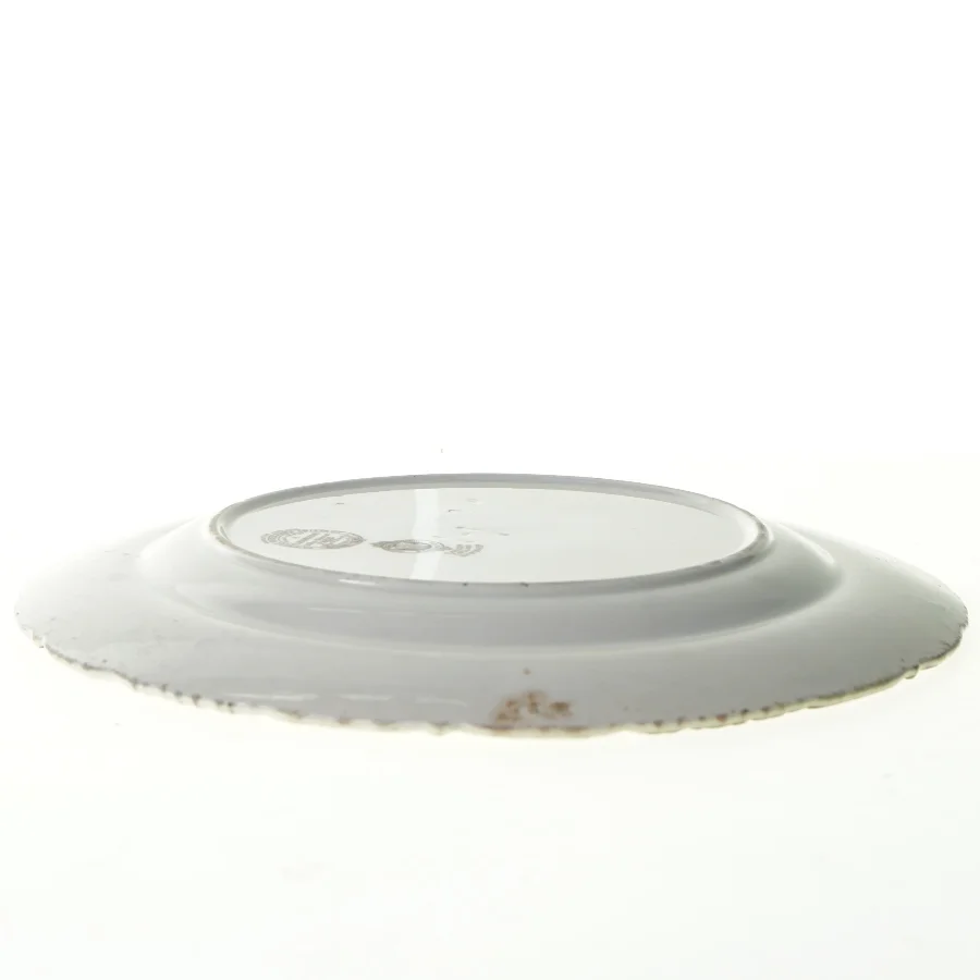 Gammel tallerken fra E. Bourgeois. Diameter 26 cm.