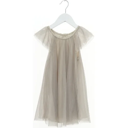 Tylkjole med pailletter fra H&M (str. 92)