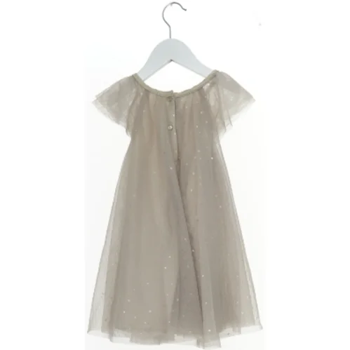 Tylkjole med pailletter fra H&M (str. 92)