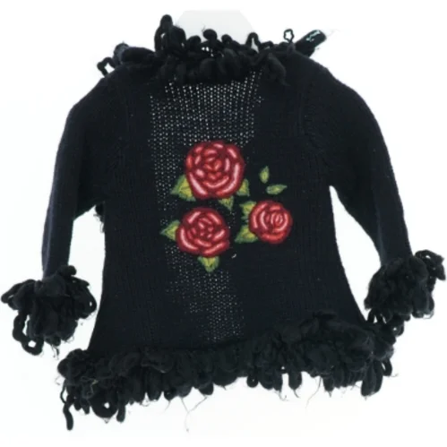 Sort cardigan med blomster fra H&M (str. 80)