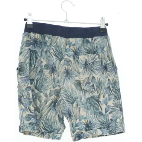 Shorts med botanisk mønster fra Pomp de Lux (str. 164)