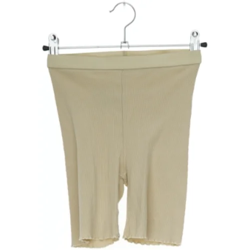 Beige cykelshorts fra Pomp de Lux (str. 152)